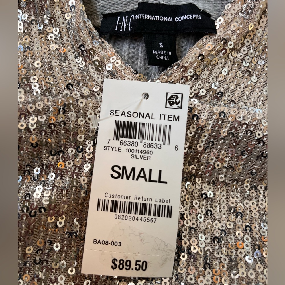 Ladies Small ,new with tags. Silver sequin light grey sweater with hood.